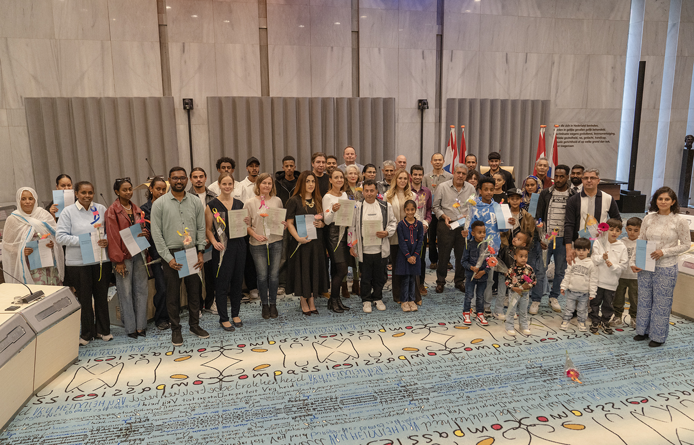 Deelnemers Naturalisatieceremonie 30 september 2025 met wethouder Van de Geijn