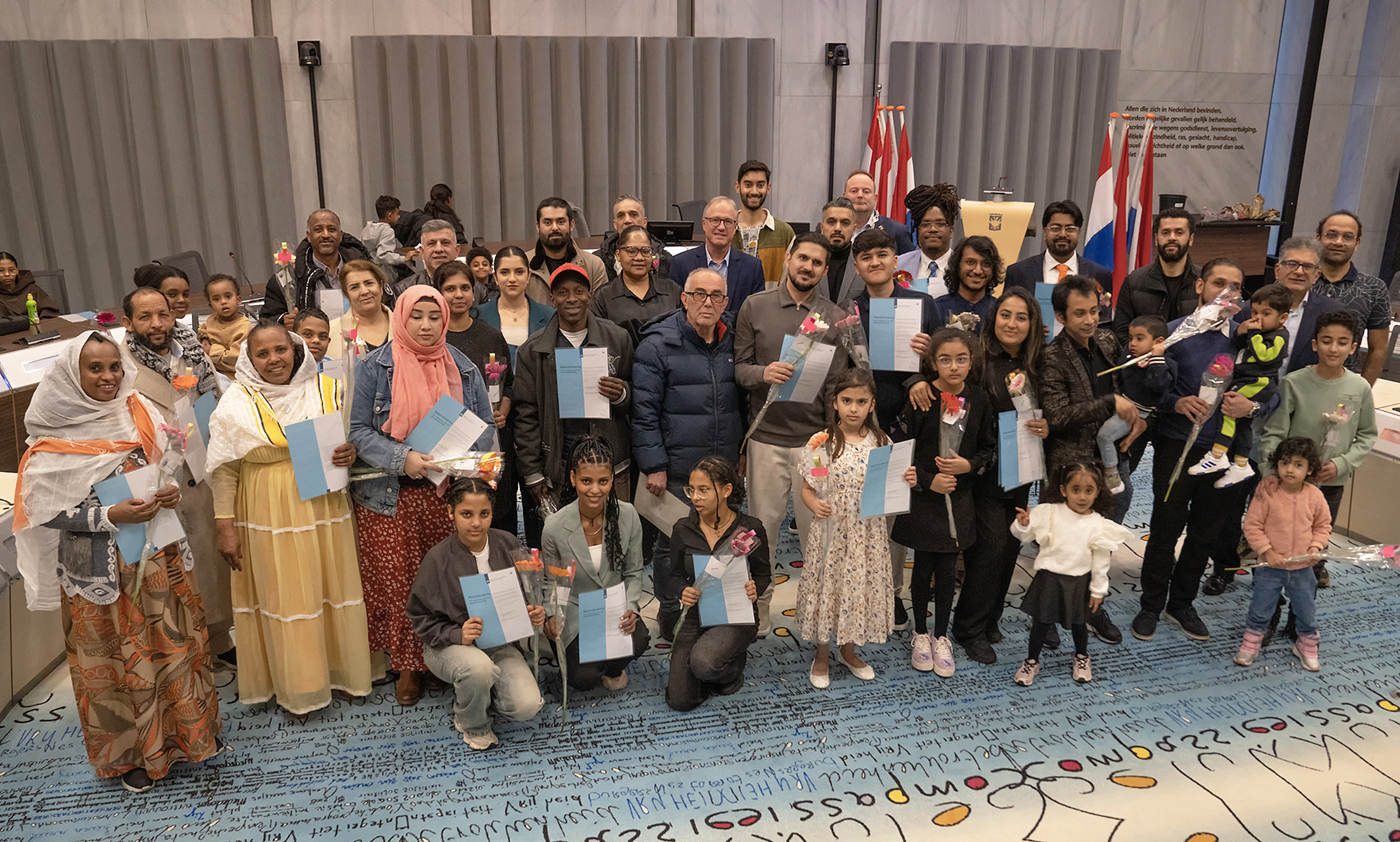 deelnemers naturalisatieceremonie 24 februari 2026